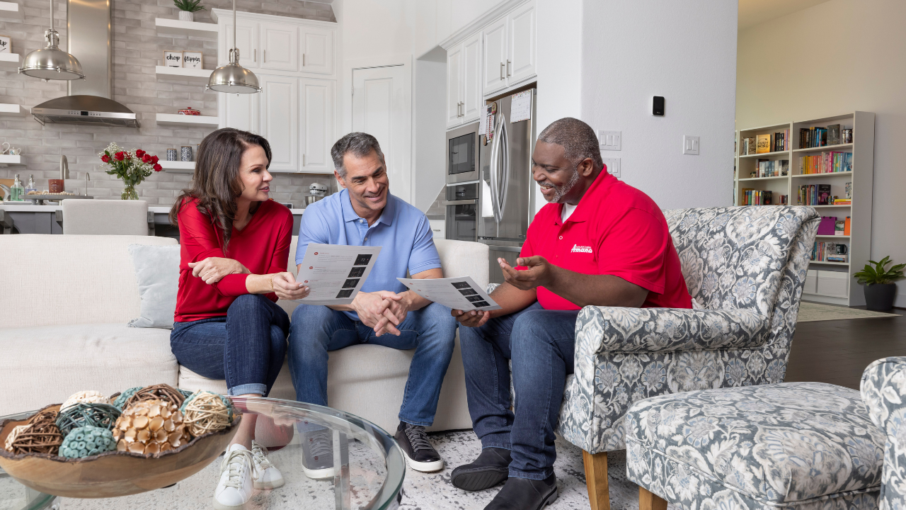 couple receiving HVAC quote